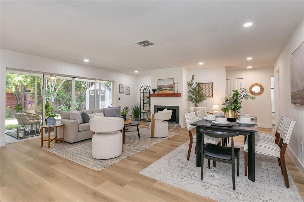 Dining room, Fireplace, Interior, Living room, Recessed Lighting, Wood Texture Flooring