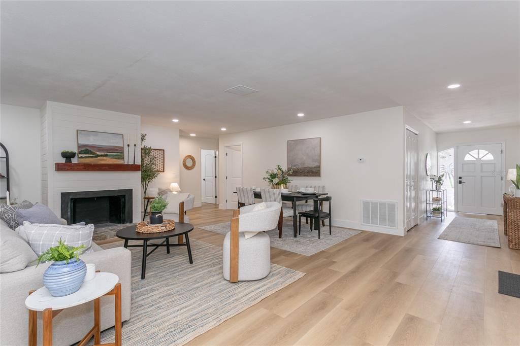 Dining room, Fireplace, Interior, Living room, Recessed Lighting, Wood Texture Flooring