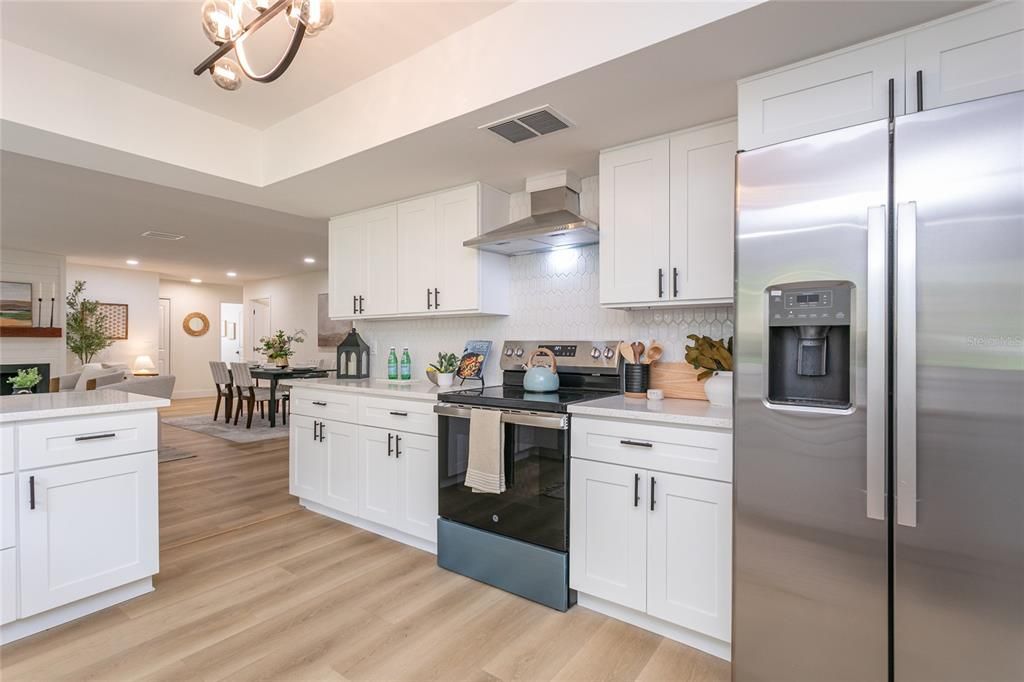 Dining room, Interior, Kitchen, Recessed Lighting, Stainless Steel Appliances, Wood Texture Flooring