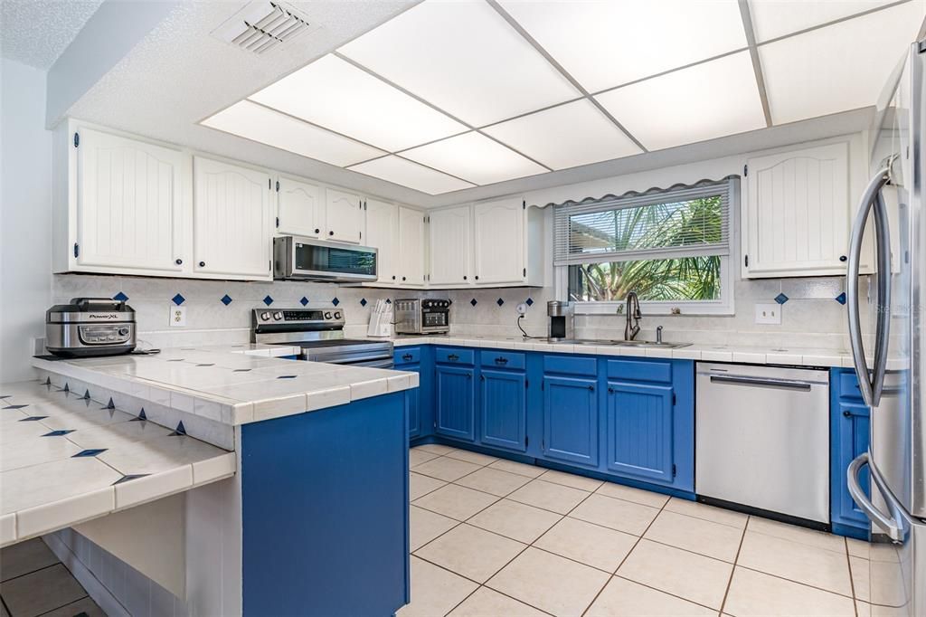 Interior, Kitchen, Stainless Steel Appliances, Tile Countertops