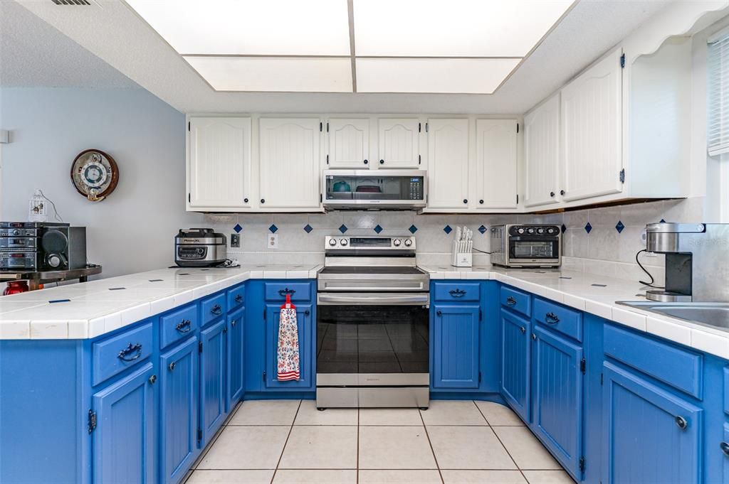 Interior, Kitchen, Stainless Steel Appliances, Tile Countertops