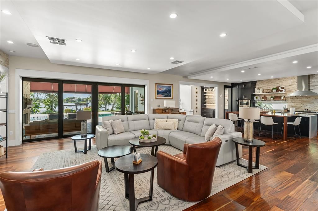 Dining room, Interior, Kitchen, Living room, Recessed Lighting, Stone Walls, Wood Texture Flooring