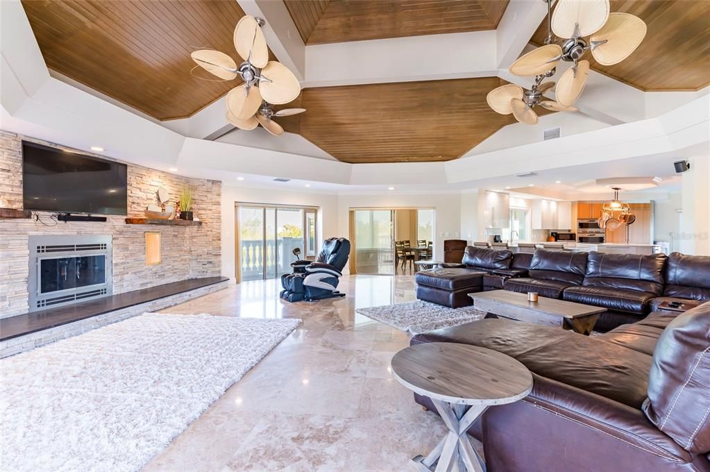 Fireplace, Interior, Living room, Recessed Lighting, Stone Walls, Wooden Ceilings