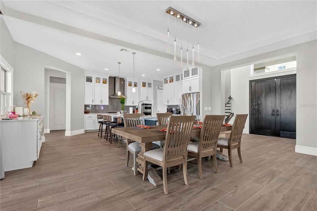Dining room, Interior, Kitchen, Pendant Lights, Recessed Lighting, Stainless Steel Appliances, Wood Texture Flooring