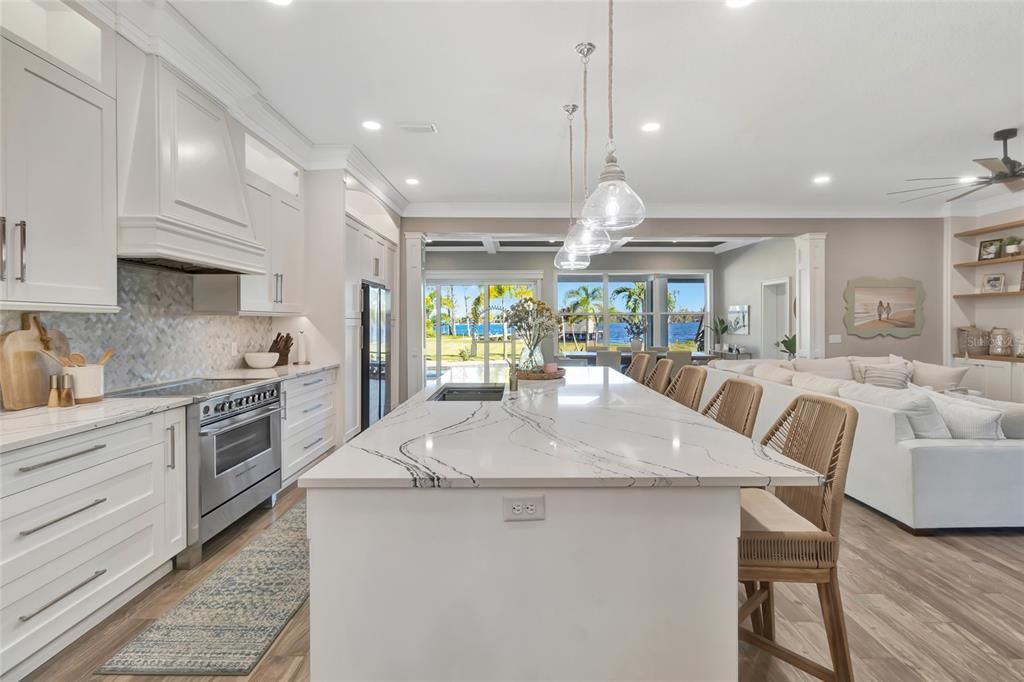 Dining room, Interior, Kitchen, Living room, Pendant Lights, Recessed Lighting, Stainless Steel Appliances, Wood Texture Flooring