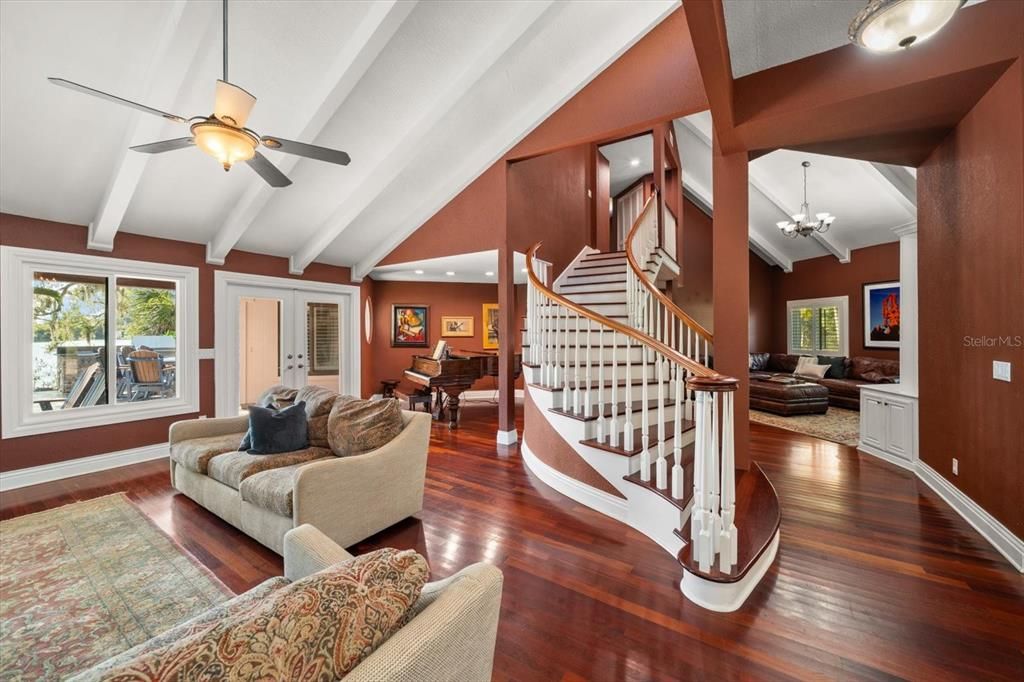 Chandelier, Dining room, Interior, Living room, Piano, Recessed Lighting, Wood Texture Flooring