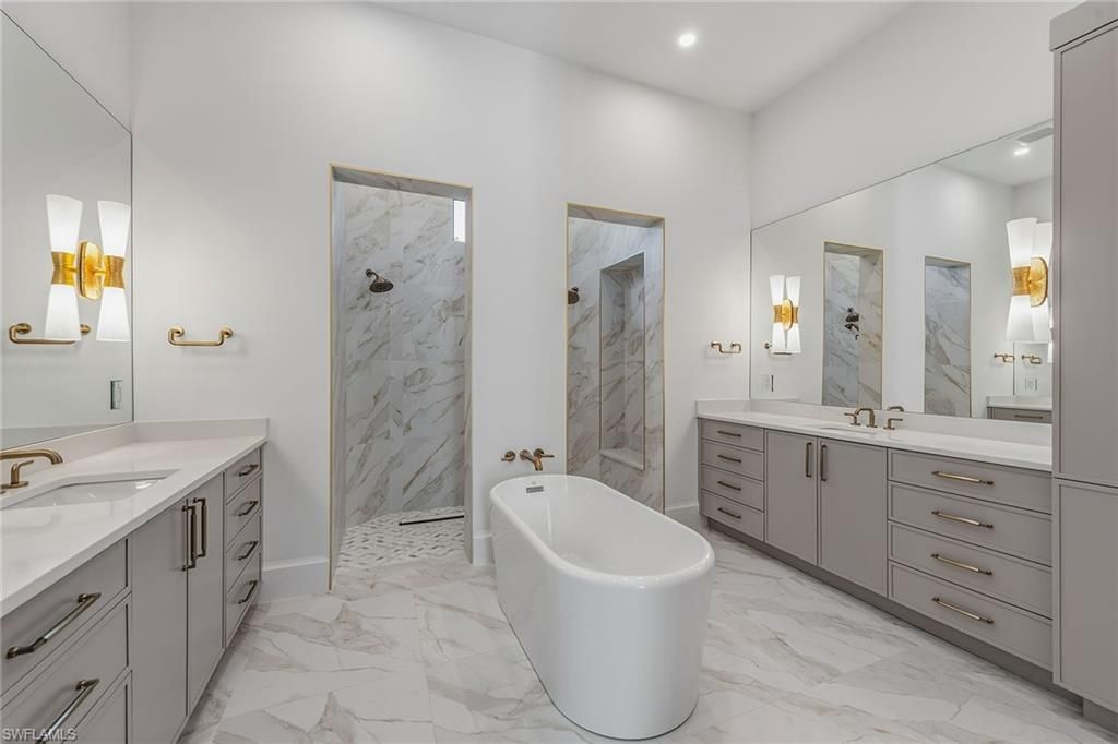 Bathroom, Dual Sink Vanities, Free Standing Baths, Interior, Marble, Marble Walls, Recessed Lighting