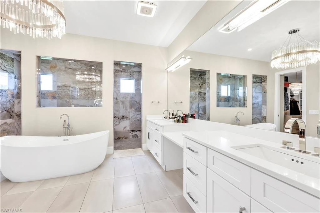 Bathroom, Chandelier, Dual Sink Vanities, Free Standing Baths, Interior, Recessed Lighting