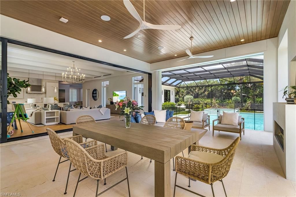 Chandelier, Dining room, Fireplace, Interior, Kitchen, Living room, Pendant Lights, Recessed Lighting, Wooden Ceilings