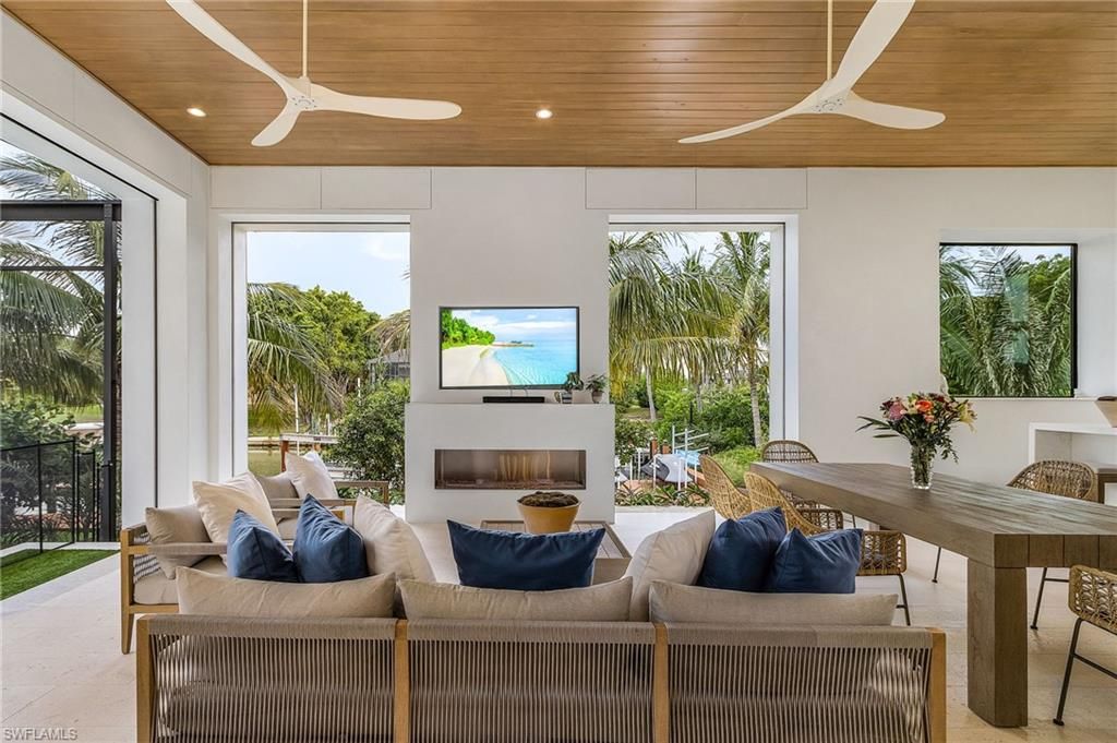 Fireplace, Interior, Living room, Recessed Lighting, Water, Wooden Ceilings