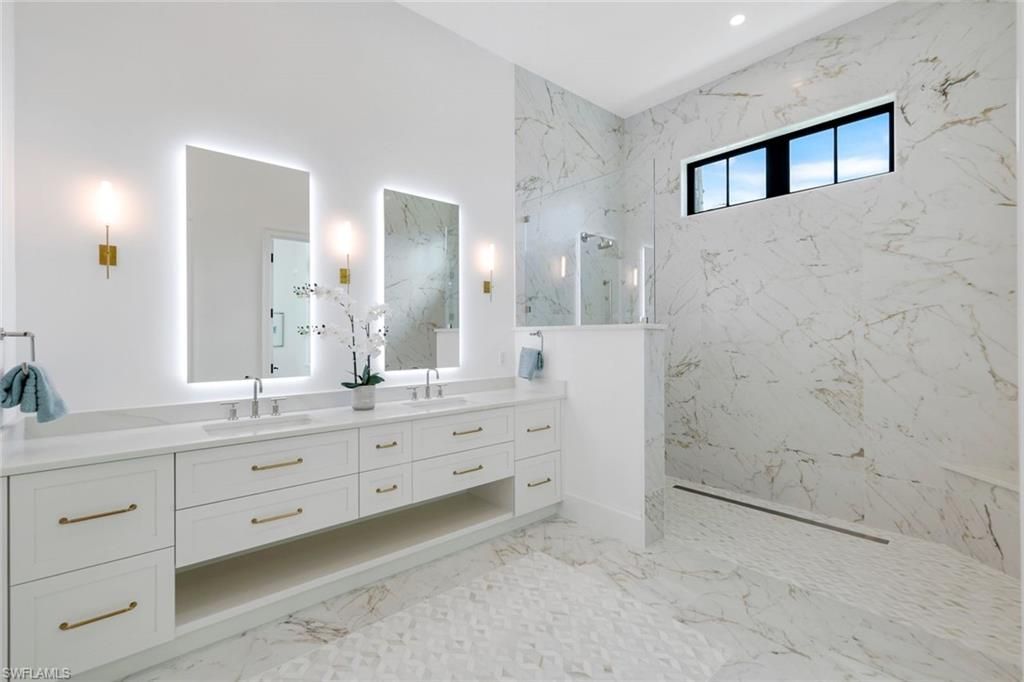 Bathroom, Dual Sink Vanities, Interior, Marble, Marble Walls, Recessed Lighting