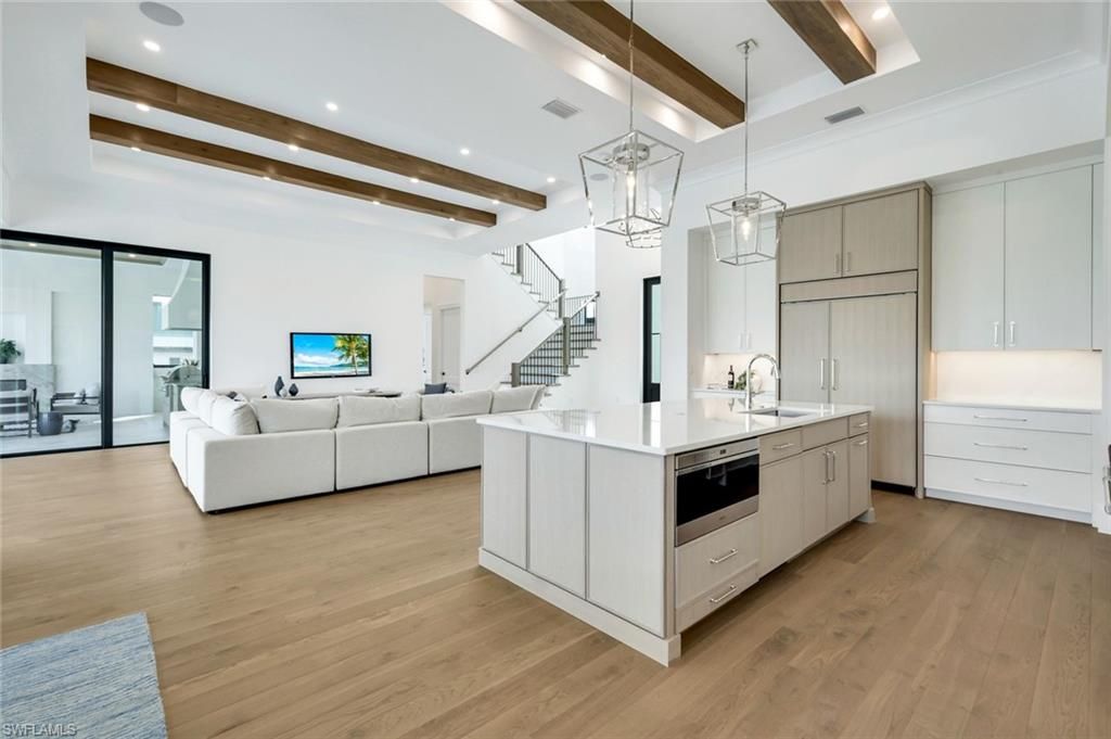 Interior, Kitchen, Living room, Pendant Lights, Recessed Lighting, Stainless Steel Appliances, Wooden Beams, Wood Texture Flooring