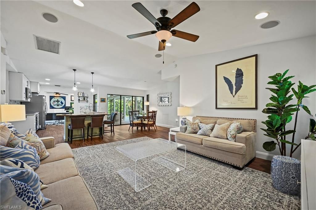 Dining room, Interior, Kitchen, Living room, Pendant Lights, Recessed Lighting, Stainless Steel Appliances, Wood Texture Flooring