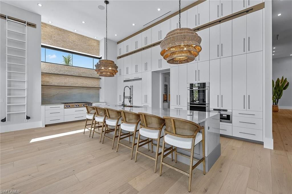 Chandelier, Interior, Kitchen, Pendant Lights, Recessed Lighting, Stainless Steel Appliances, Wood Texture Flooring