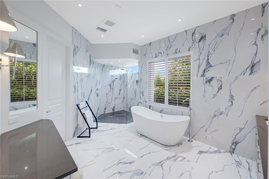 Bathroom, Free Standing Baths, Interior, Marble, Marble Walls, Recessed Lighting
