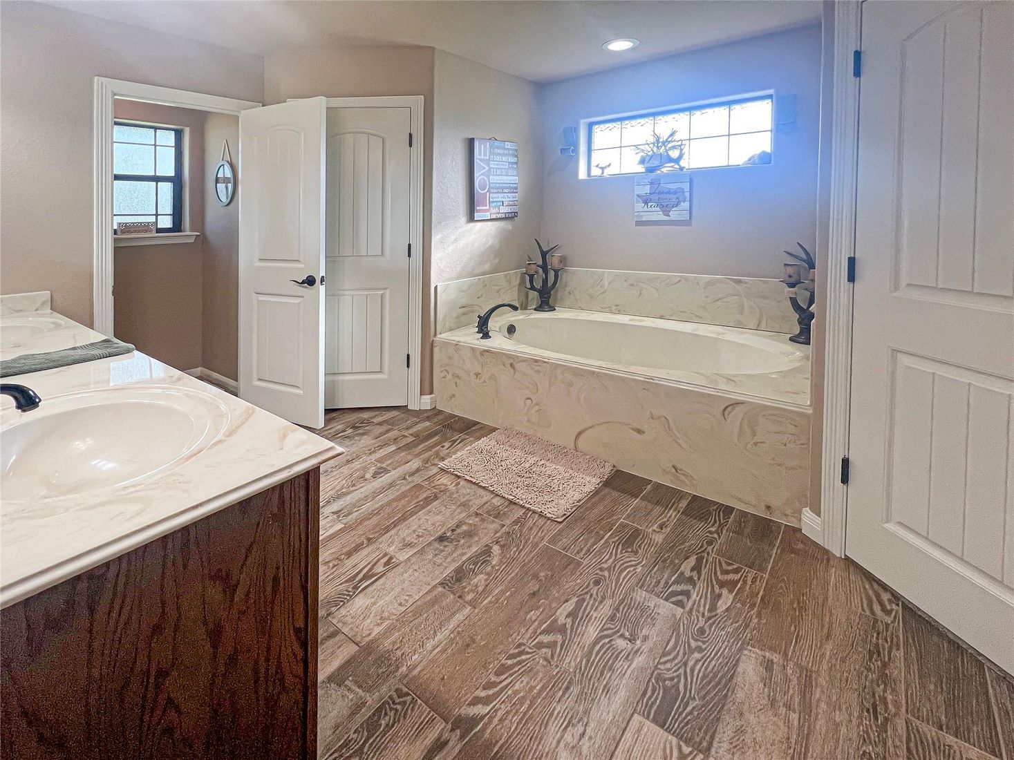 Bathroom, Dual Sink Vanities, Interior, Recessed Lighting, Wood Texture Flooring
