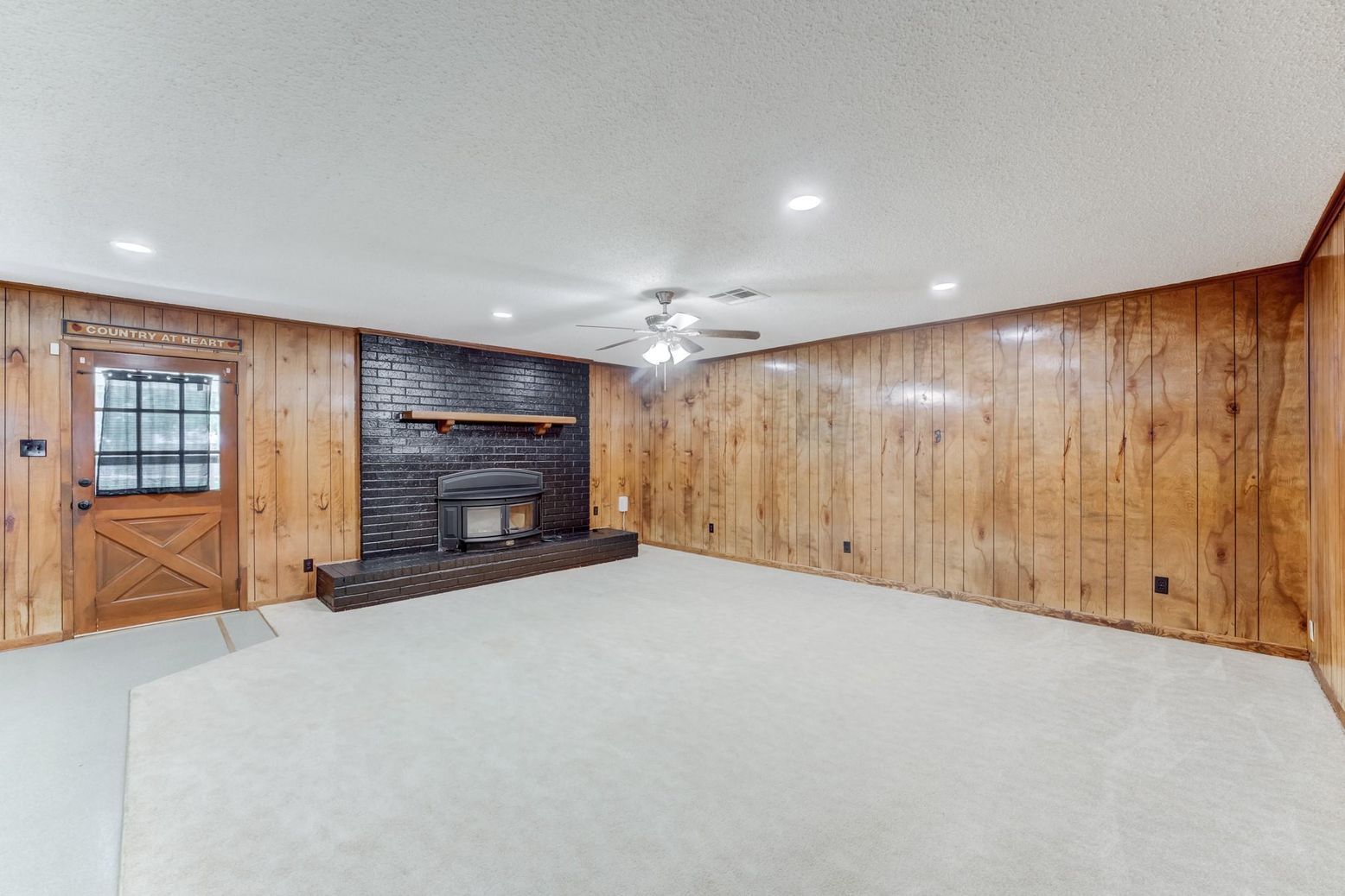 Empty room, Fireplace, Interior, Recessed Lighting, Stone Walls, Wooden Walls