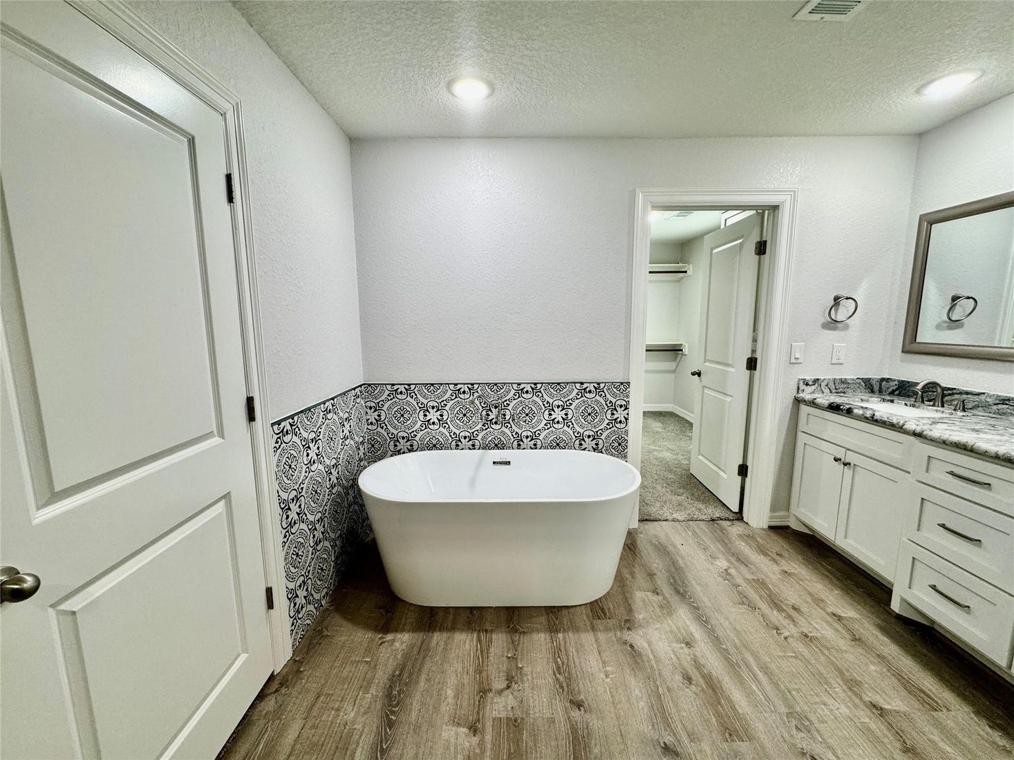Bathroom, Free Standing Baths, Interior, Recessed Lighting, Wood Texture Flooring