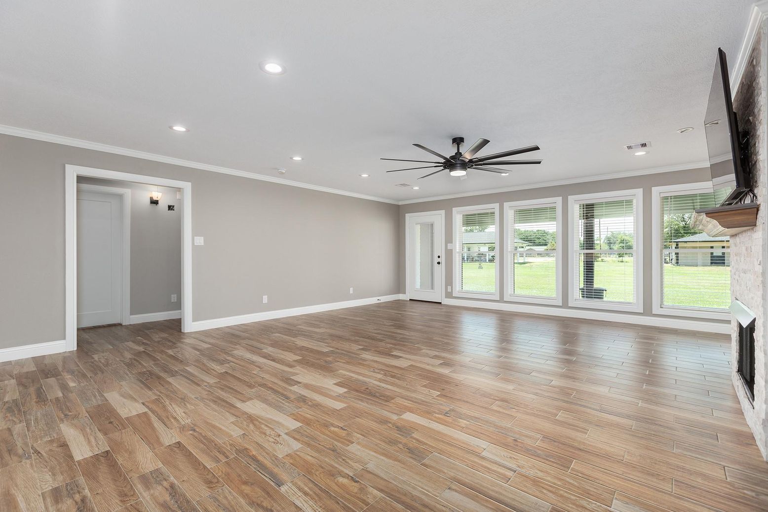 Empty room, Fireplace, Interior, Recessed Lighting, Wood Texture Flooring