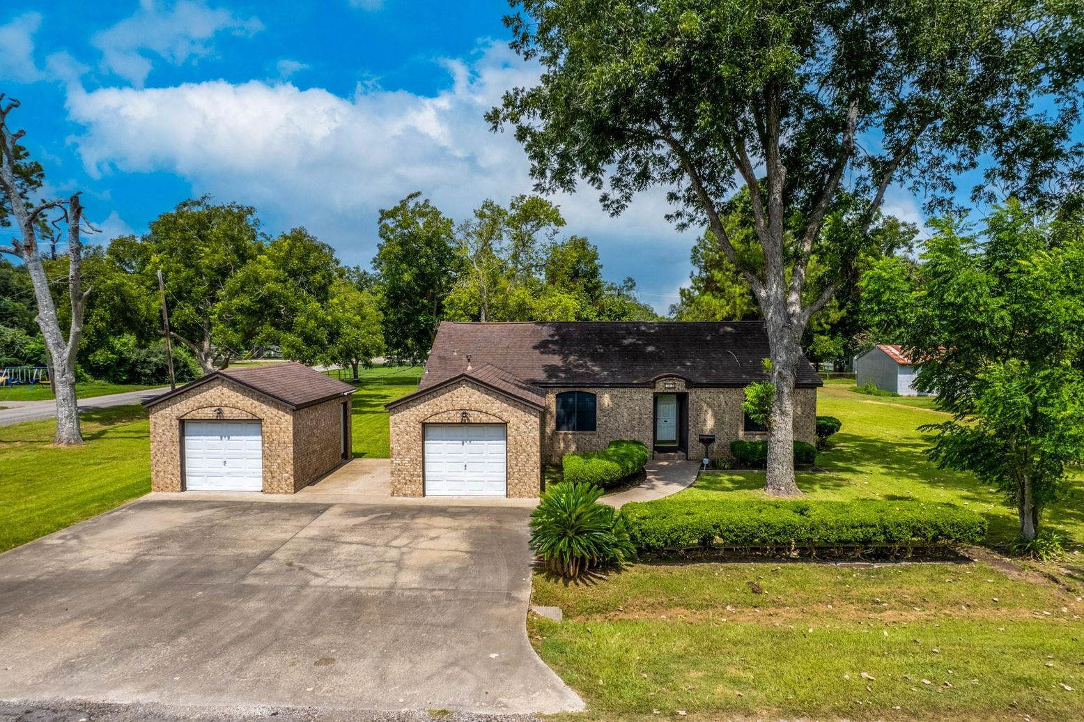 Attached, Backyard, Detached Garage, Exterior, Facade, Brick Facade, Mediterranean
