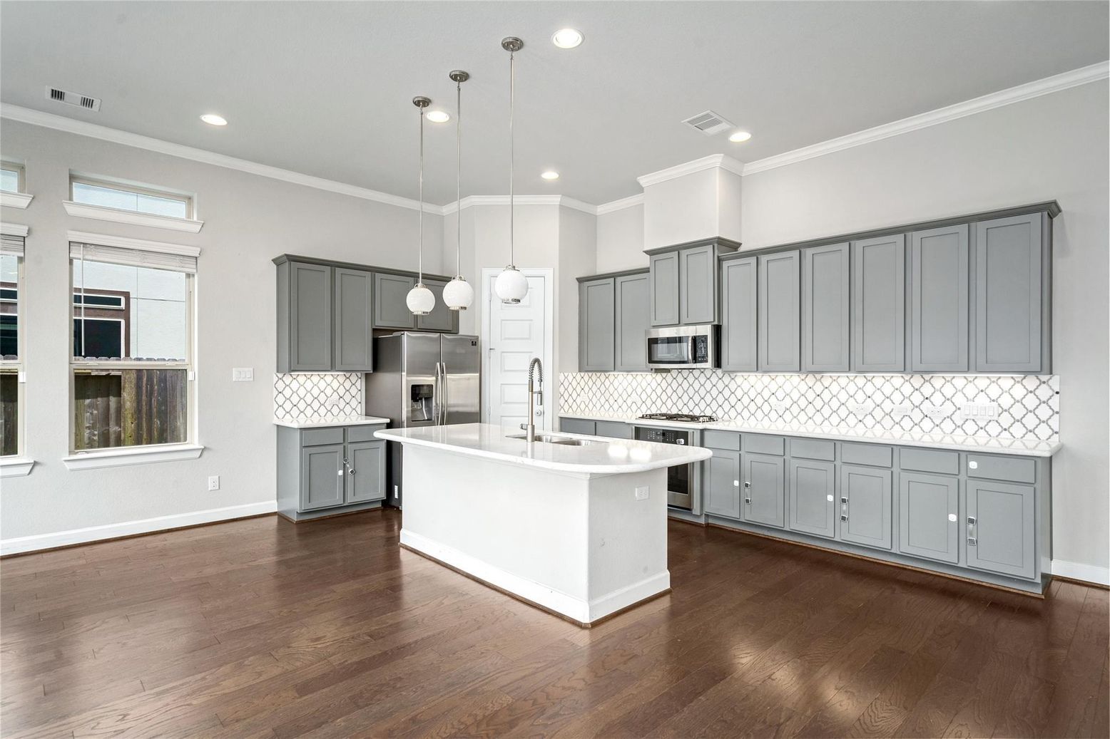 Interior, Kitchen, Pendant Lights, Recessed Lighting, Stainless Steel Appliances, Wood Texture Flooring
