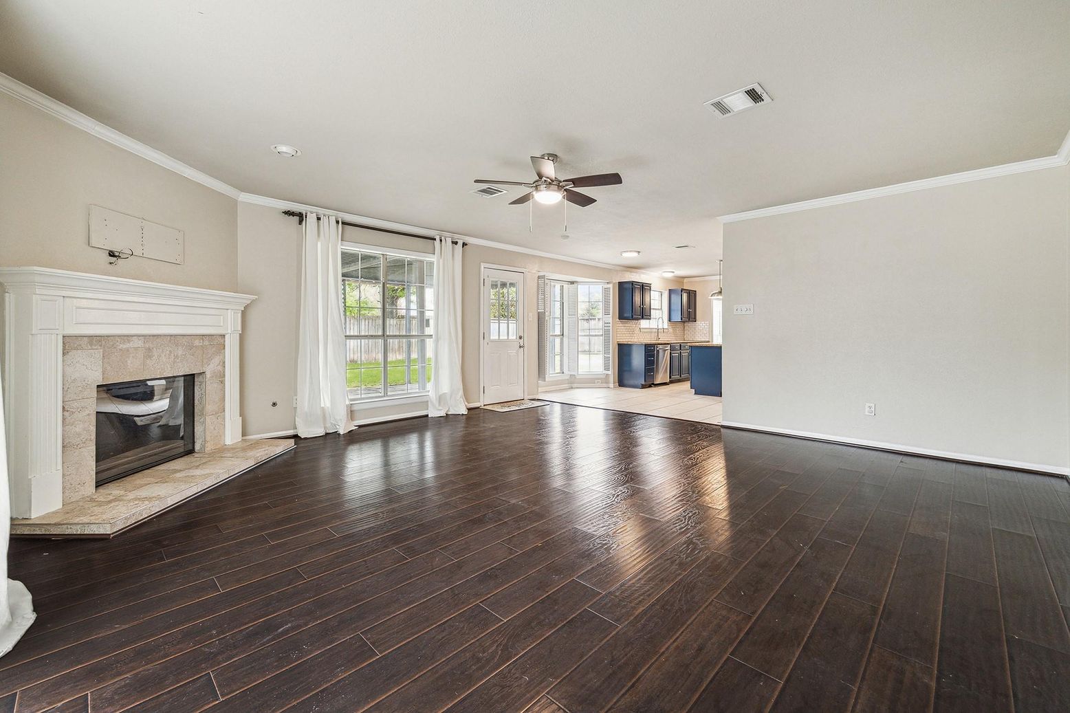 Empty room, Fireplace, Interior, Kitchen, Recessed Lighting, Wood Texture Flooring