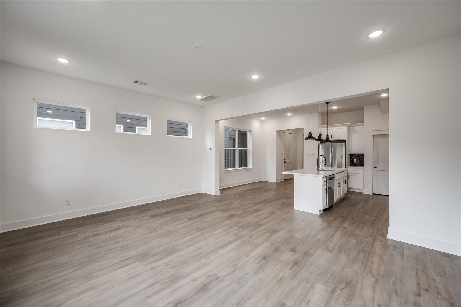 Empty room, Interior, Kitchen, Pendant Lights, Recessed Lighting, Wood Texture Flooring