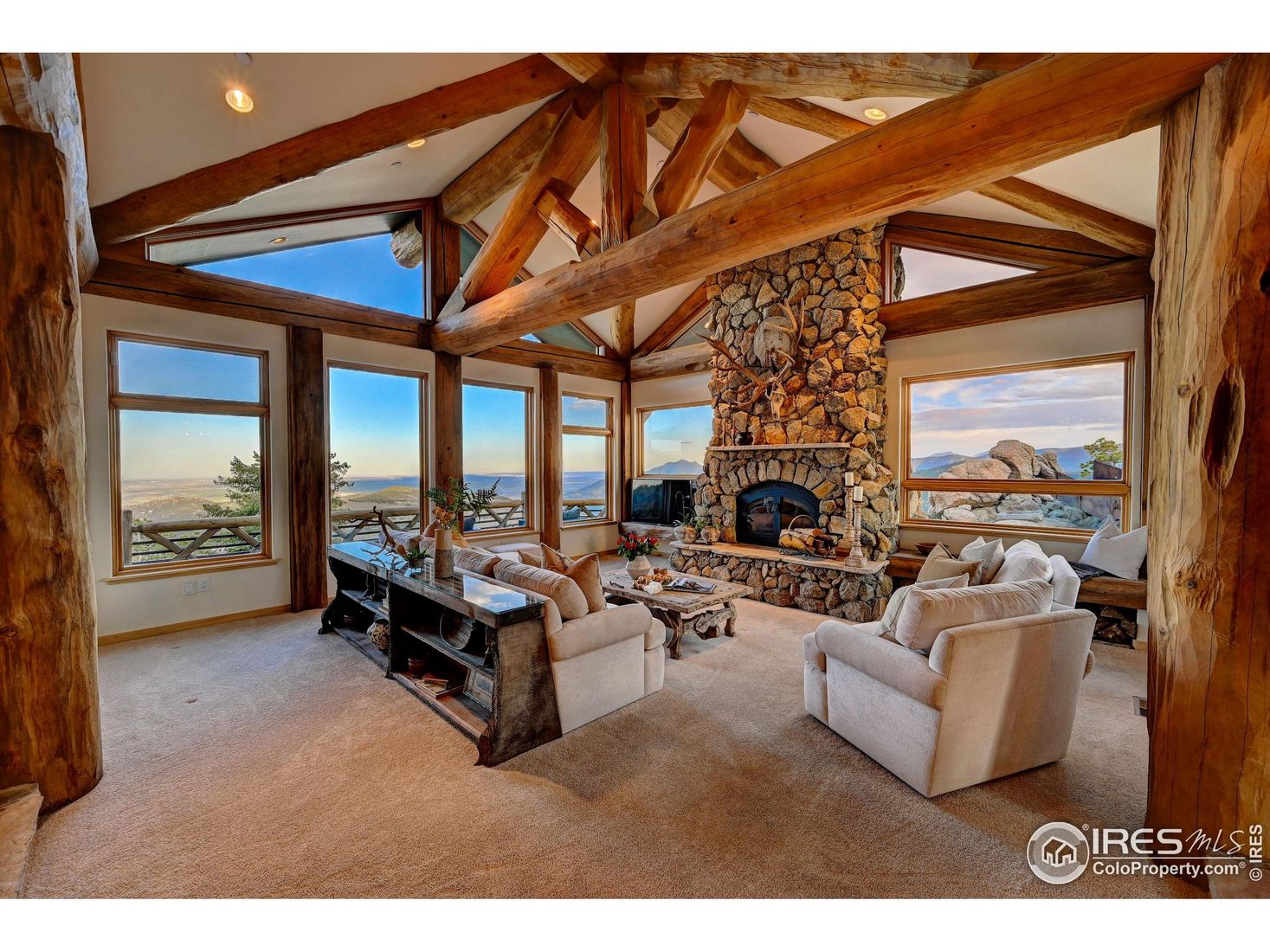 Fireplace, Interior, Living room, Recessed Lighting, Stone Walls, Water, Wooden Beams