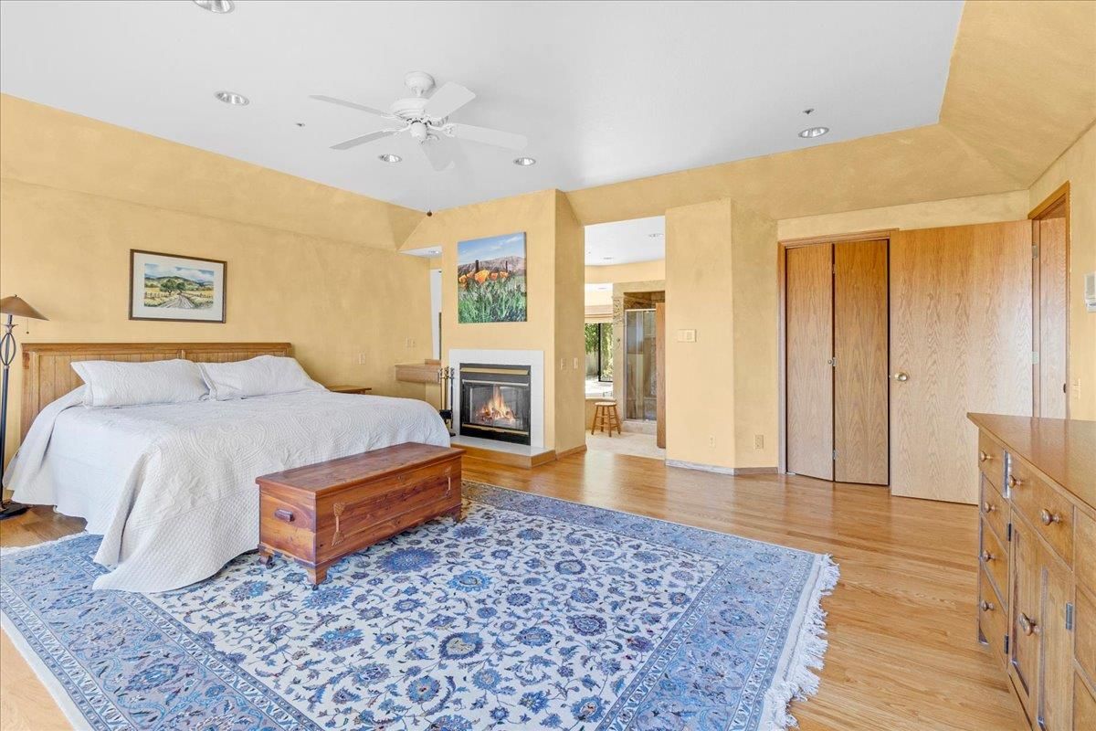 Bedroom, Fireplace, Interior, Recessed Lighting, Wood Texture Flooring