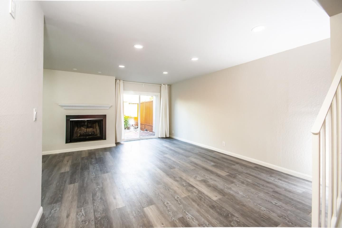 Empty room, Fireplace, Interior, Recessed Lighting, Wood Texture Flooring