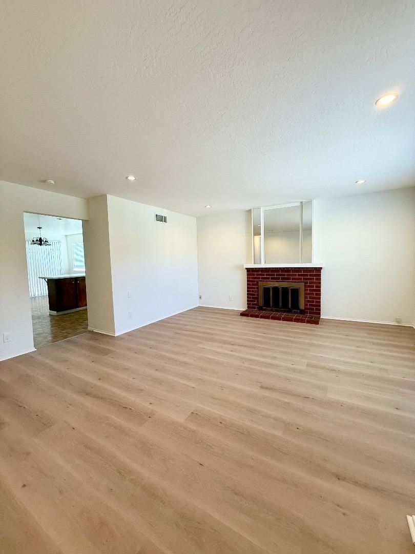 Empty room, Fireplace, Interior, Recessed Lighting, Wood Texture Flooring