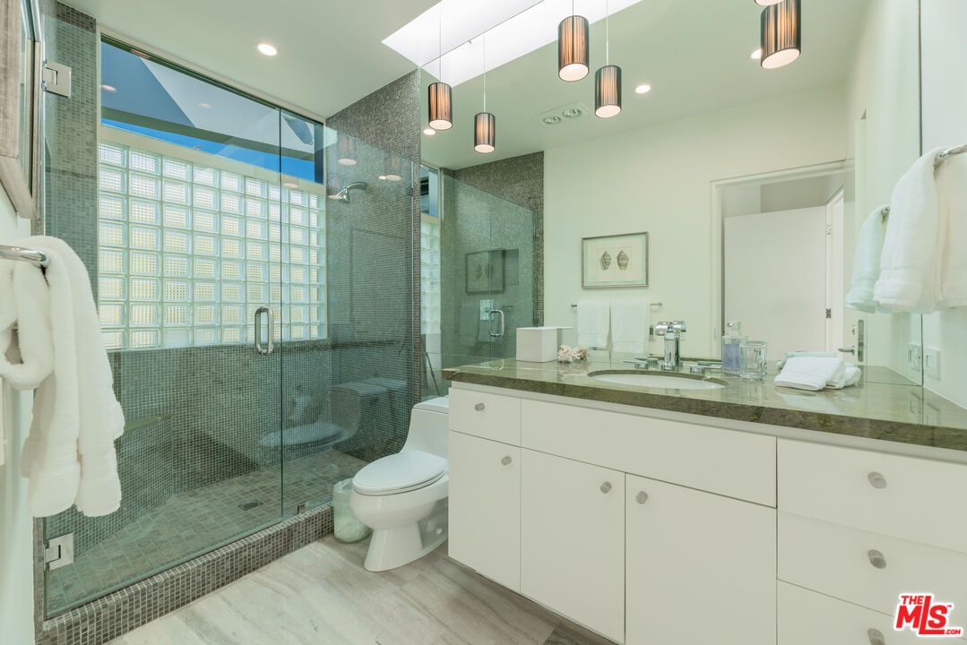 Bathroom, Glass Shower, Interior, Pendant Lights, Recessed Lighting, Wood Texture Flooring
