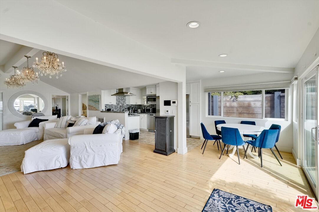 Chandelier, Dining room, Interior, Kitchen, Living room, Recessed Lighting, Stainless Steel Appliances, Wood Texture Flooring