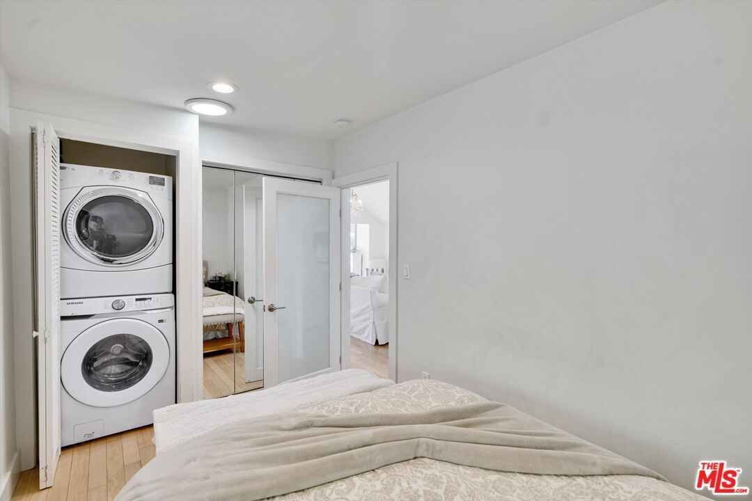 Bedroom, Interior, Recessed Lighting, Utility Closets, Washer, Wood Texture Flooring