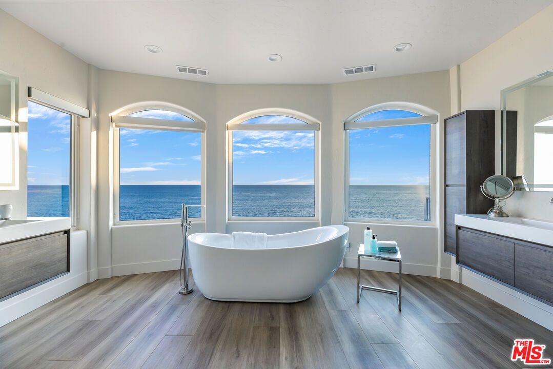 Bathroom, Free Standing Baths, Interior, Recessed Lighting, Water, Wood Texture Flooring