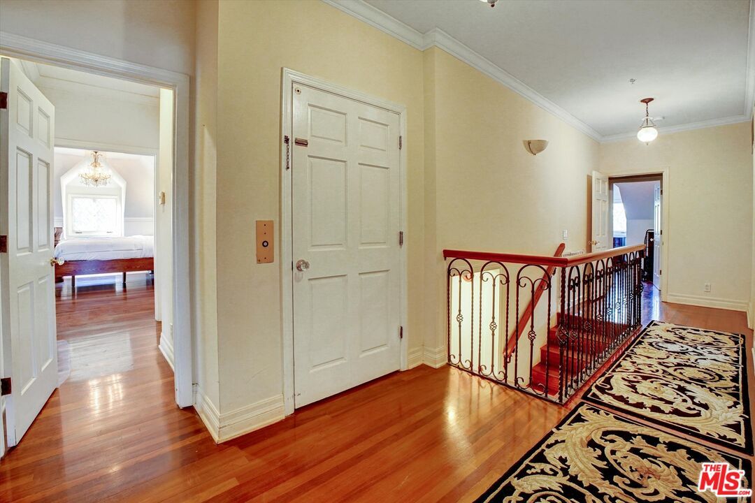 Chandelier, Elevator, Interior, Wood Texture Flooring