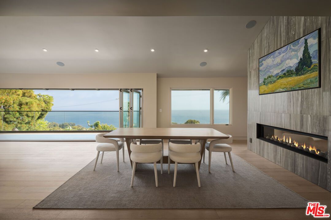 Dining room, Fireplace, Interior, Recessed Lighting, Water, Wood Texture Flooring