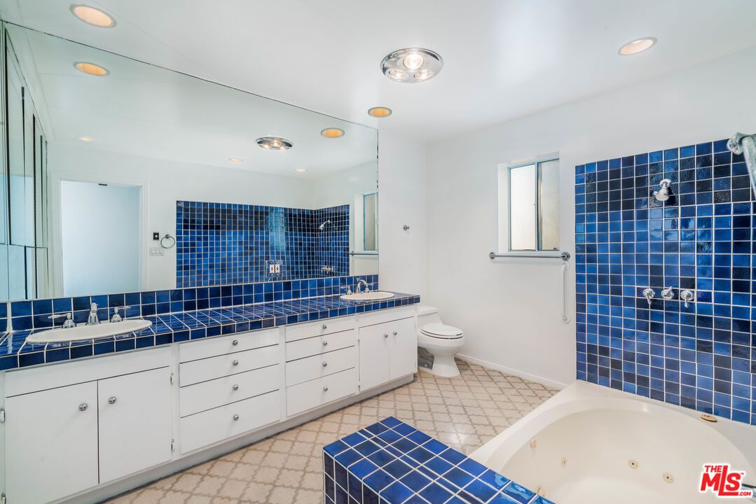 Bathroom, Dual Sink Vanities, Interior, Recessed Lighting, Tile Countertops