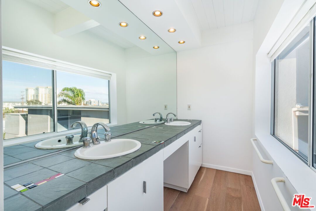 Bathroom, Dual Sink Vanities, Interior, Recessed Lighting, Tile Countertops, Wood Texture Flooring