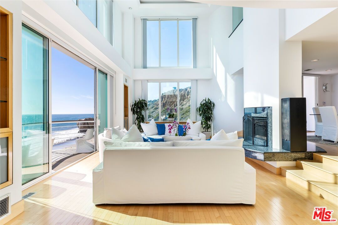 Fireplace, Interior, Living room, Recessed Lighting, Water, Wood Texture Flooring