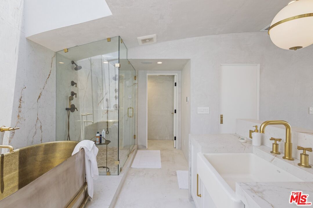 Bathroom, Dual Sink Vanities, Glass Shower, Interior, Marble Walls, Recessed Lighting