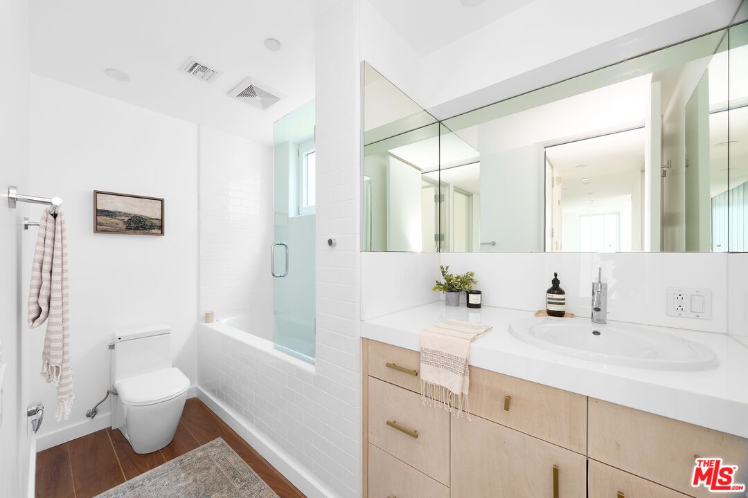 Bathroom, Dual Sink Vanities, Glass Shower, Interior, Wood Texture Flooring
