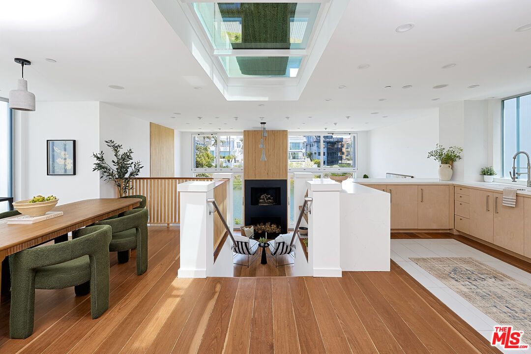 Dining room, Fireplace, Interior, Pendant Lights, Recessed Lighting, Wood Texture Flooring