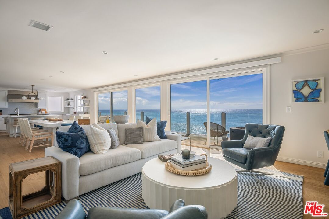 Dining room, Interior, Kitchen, Living room, Pendant Lights, Recessed Lighting, Water, Wood Texture Flooring