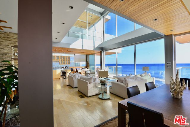 Dining room, Interior, Kitchen, Living room, Pendant Lights, Recessed Lighting, Water, Wooden Ceilings, Wood Texture Flooring