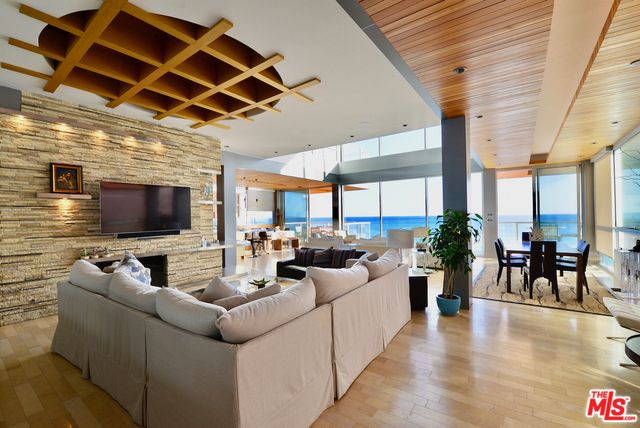 Dining room, Interior, Living room, Recessed Lighting, Stone Walls, Water, Wooden Beams, Wooden Ceilings, Wood Texture Flooring