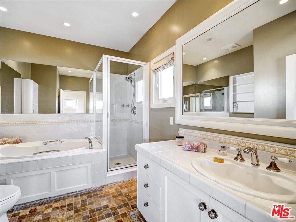 Bathroom, Dual Sink Vanities, Glass Shower, Interior, Recessed Lighting, Tile Countertops