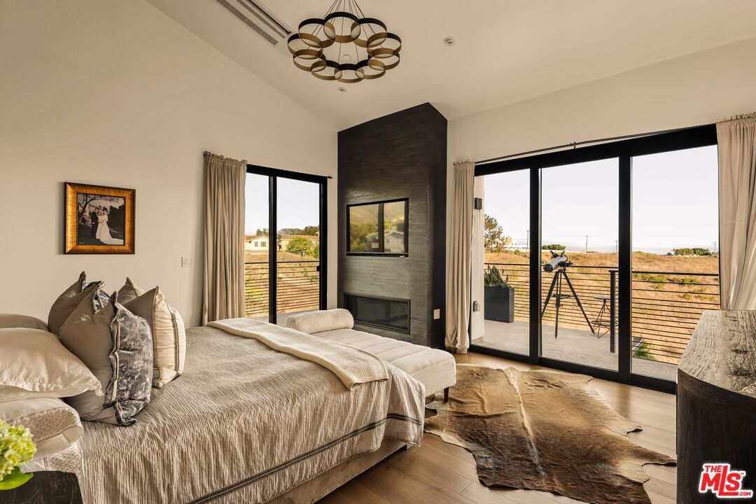 Bedroom, Fireplace, Interior, Pendant Lights, Wood Texture Flooring