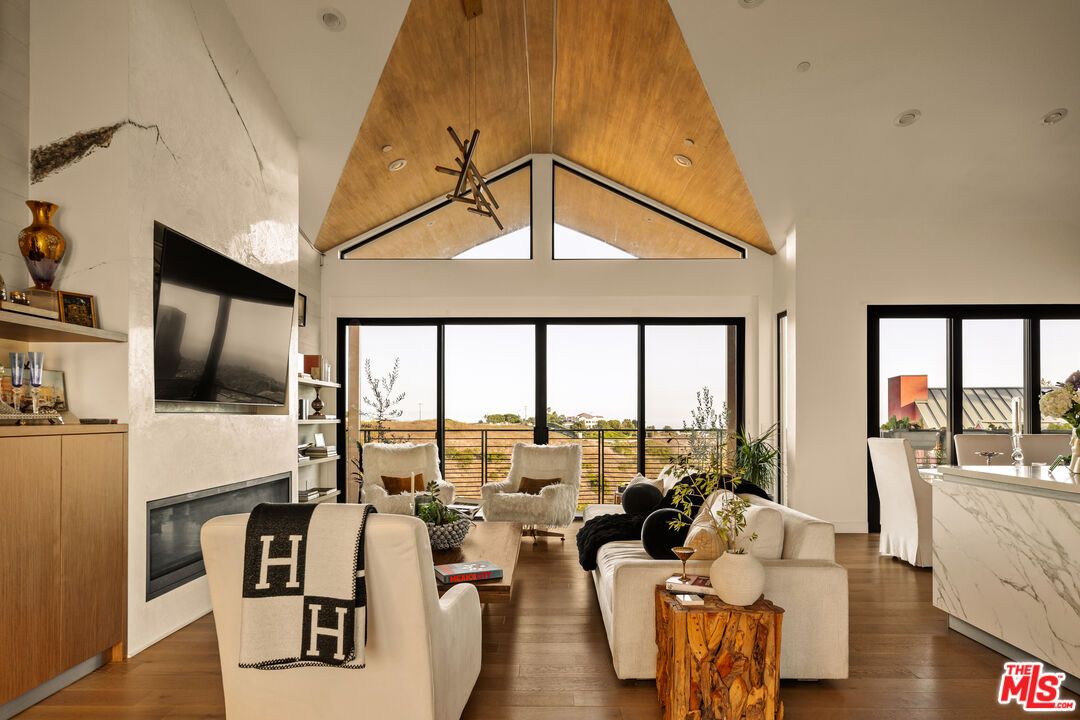 Fireplace, Interior, Living room, Pendant Lights, Recessed Lighting, Wooden Ceilings, Wood Texture Flooring