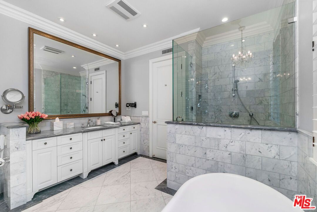 Bathroom, Chandelier, Dual Sink Vanities, Glass Shower, Interior, Marble, Marble Walls, Recessed Lighting